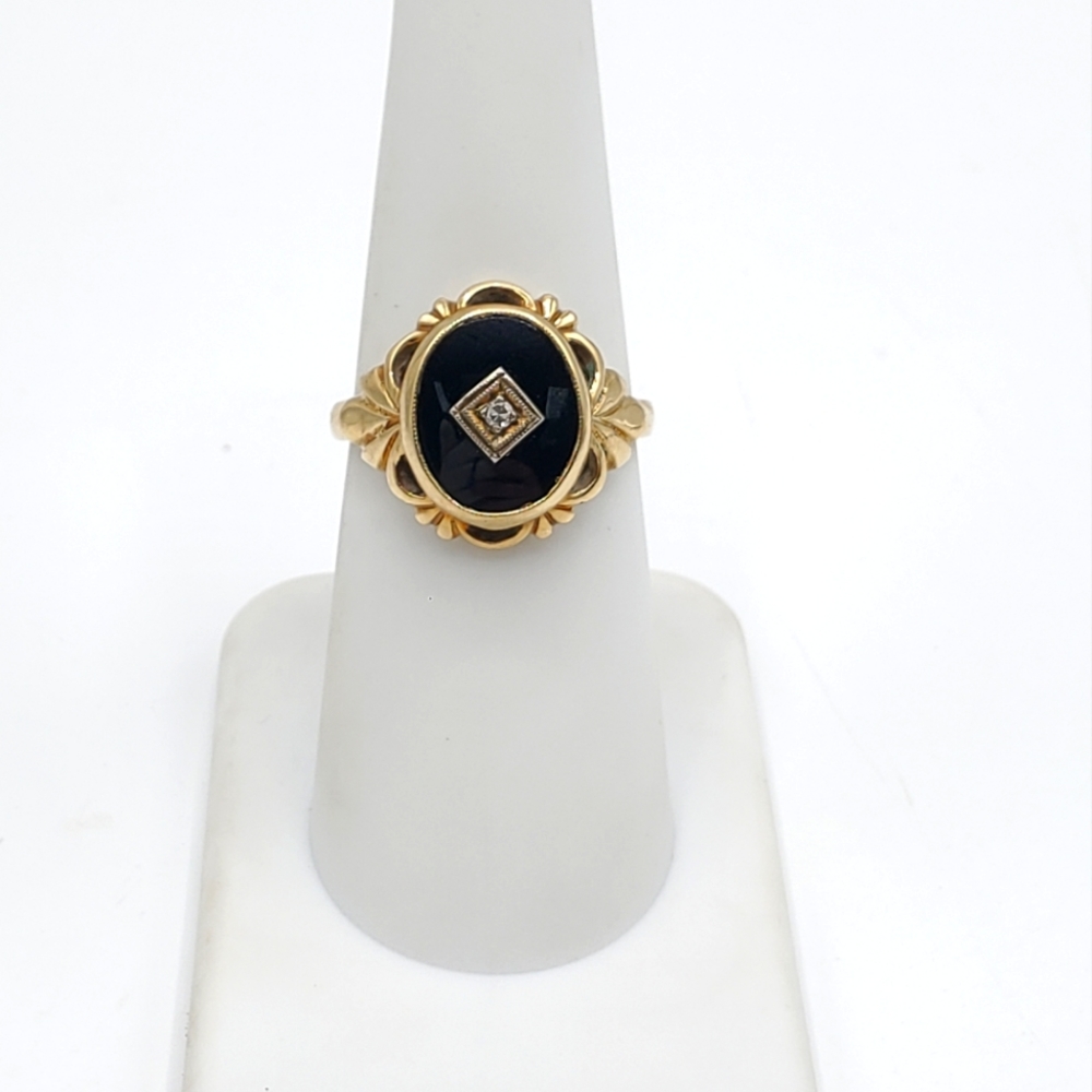 Elegant Black and Gold Ring with Diamond Accent